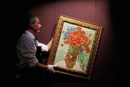 凡·高静物油画《雏菊与罂粟花》。
