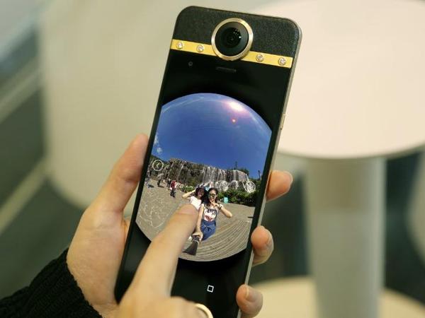 报码:【j2开奖】相比iPhone7，你会花多少钱买一款VR手机？